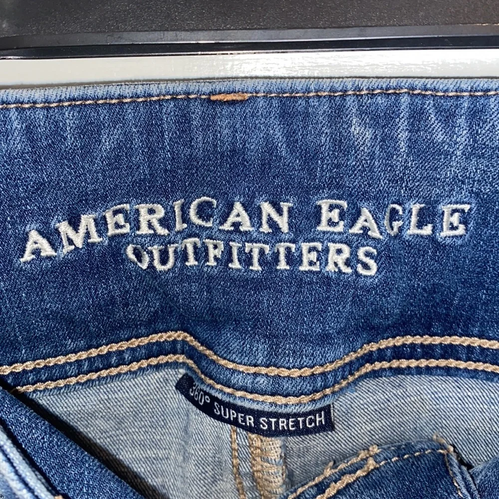 American Eagle super hi rise distressed skinny jeans
